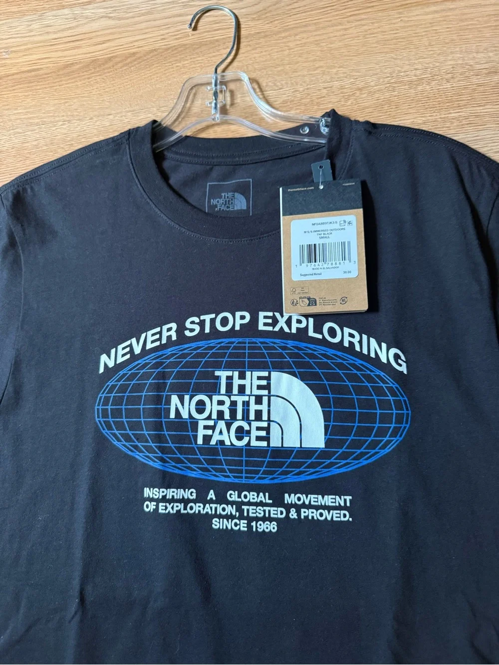 The North Face Black Short-Sleeve Tee with Blue Globe Graphic